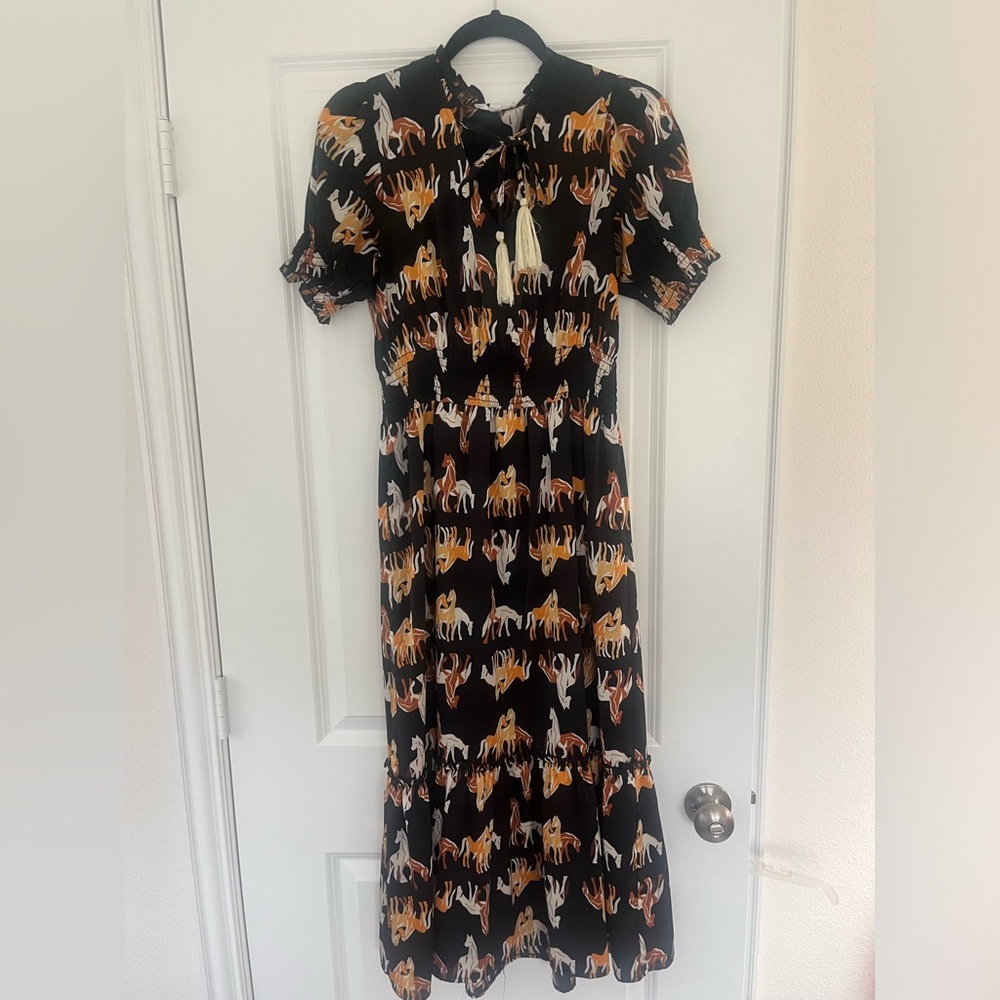 New dress from Eve’s Resolution in Colorado Springs, Colorado. Horses.